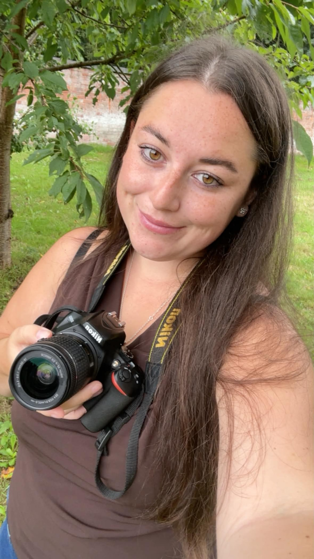 Jess Adams outdoors with her camera